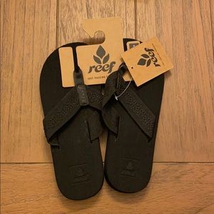 Black reef flip flops